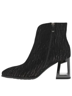 Boots en cuir noires avec un talon décroché haut ouvert et un zip