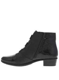 Boots en cuir noires à talon décroché bas avec un zip côté interne