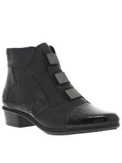 Boots en cuir noires à talon décroché bas avec un zip côté interne