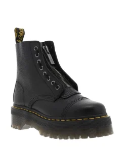 Boots en cuir noires à talon plateau avec un zip et revêtement en grains