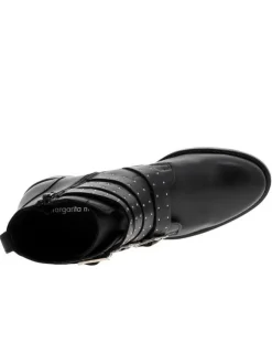 Boots en cuir noir à semelle et talon plat et à zip latérale intérieur