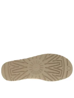 Boots en cuir sable à talon plat avec une languette d'enfilage