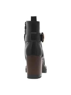 Boots noires à talon décroché haut avec un zip et une boucle décorative