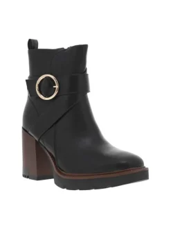 Boots noires à talon décroché haut avec un zip et une boucle décorative