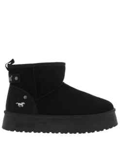 Boots noires à talon plateau et à slip-on avec l'intérieur en fausse fourrure