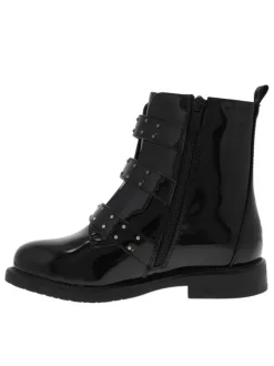Bottillons fourrés noirs vernis à talon bas, grosses boucles métallisées et zip