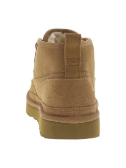 Bottines en cuir camel à talon plat et une doublure en fausse fourrure