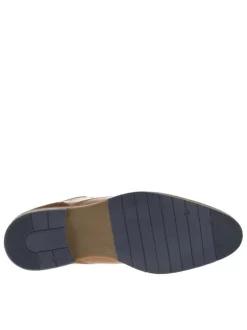 Bottines en cuir cognac avec un talon décroché bas et des lacets
