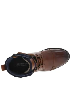 Bottines en cuir marron fourrées avec empiècements foncées, lacets tressés marrons et fermeture zippée