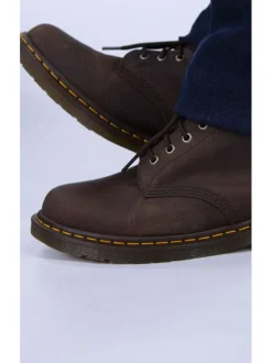 Bottines en cuir marron à talon décroché bas avec des lacets ronds
