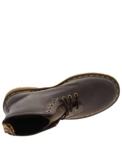 Bottines en cuir marron à talon décroché bas avec des lacets ronds