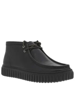 Bottines en cuir noires à semelle striée plates et à lacets ronds tressés