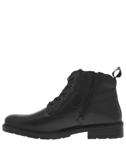 Bottines en cuir noires à talon décroché bas pourvues d'un zip latéral