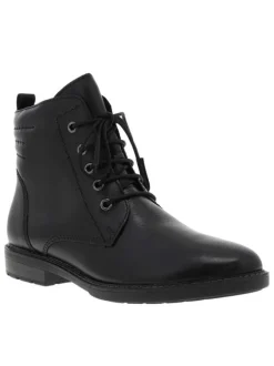 Bottines en cuir noires à talon plat avec un effet matelassé à l'arrière