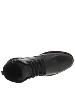Bottines en cuir noires à talon plat avec un zip et des lacets ronds