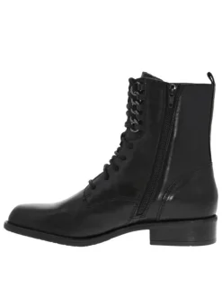 Bottines en cuir noir à semelle à trépointe striée à talon décroché bas et à lacets et zip latéral