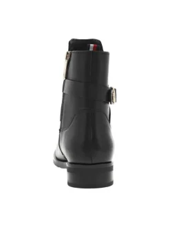 Bottines en cuir noir à talon décroché bas et à zip, détails dorés