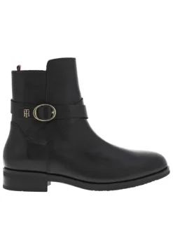 Bottines en cuir noir à talon décroché bas et à zip, détails dorés