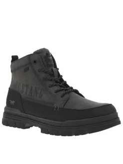 Bottines grises à talon plat pourvues d'une fermeture zippée et de lacets