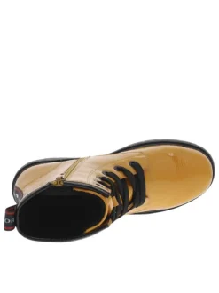 Bottines jaunes vernies fourrées à semelle crantée et frise iconique