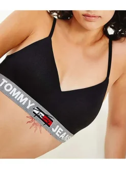 Brassière noire unie avec bande grise resserrée élastiquement sous la poitrine