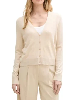 Cardigan beige uni léger avec un col v et des boutons à l'avant