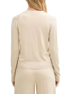 Cardigan beige uni léger avec un col v et des boutons à l'avant
