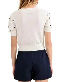 Cardigan blanc avec des cœurs imprimés et une coupe droite à col v