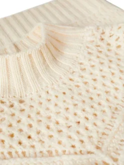 Cardigan Canica beige en maille ajourée avec une coupe droite et col montant