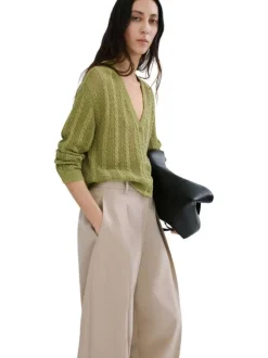Cardigan olive uni pourvu d'une coupe droite et de manches longues
