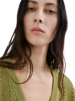 Cardigan olive uni pourvu d'une coupe droite et de manches longues