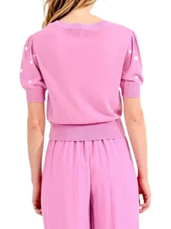 Cardigan rose avec des cœurs imprimés à col v et coupe droite