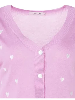 Cardigan rose avec des cœurs imprimés à col v et coupe droite