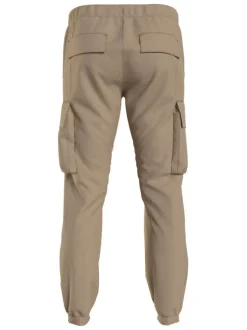 Cargo beige uni avec une coupe skinny fit et un lien de serrage à la taille