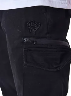 Cargo en coton noir uni slim avec poches zippées et fermeture à bouton et zip