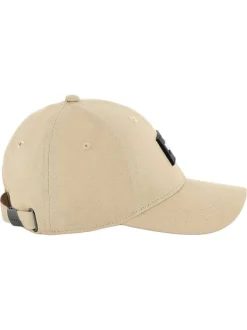 Casquette en coton beige unie ajustable avec un patch à l'avant