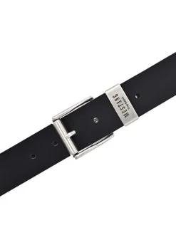 Ceinture en cuir noir unie réglable avec une boucle argentée