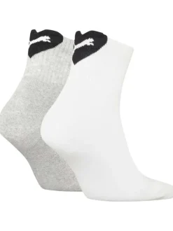 Chaussettes hautes blanches avec un coeur brodé à l'arrière en noir