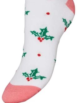 Chaussettes hautes blanches, vertes et rouges avec un imprimé houx