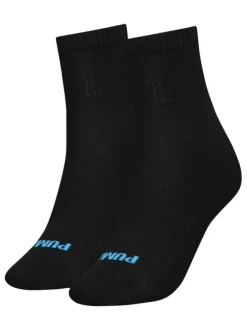 Chaussettes hautes noires avec un coeur à l'arrière brodé en bleu