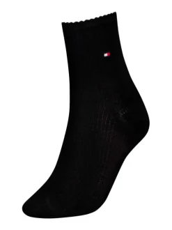 Chaussettes hautes noires unies mi-hautes avec logo brodé sur la cheville