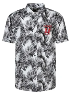 Chemise blanche en coton avec des motifs une coupe droite et un col boutonné