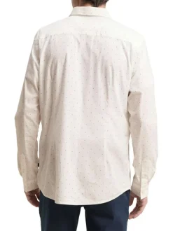 Chemise blanche en coton pourvu d'un col à rabats et d'un motif à pois