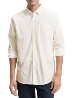 Chemise blanche en coton pourvu d'un col à rabats et d'un motif à pois