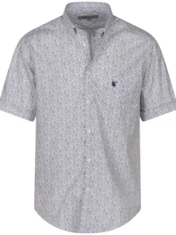 Chemise blanche à pois rouges avec un col américain et des manches courtes