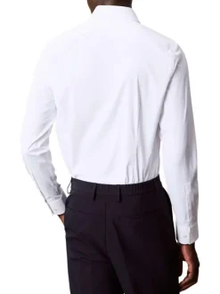 Chemise blanche unie à coupe slim et à manches longues boutonnées
