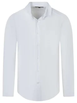 Chemise blanche unie pourvue d'une coupe droite et des manches longues