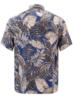 Chemise bleue imprimé feuille avec une coupe droite et un col cubain