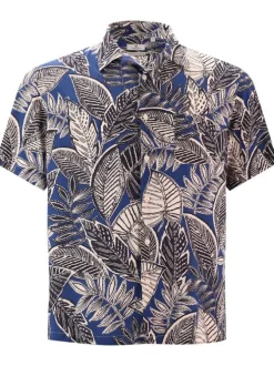 Chemise bleue imprimé feuille avec une coupe droite et un col cubain