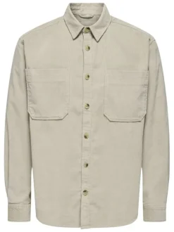 Chemise écrue unie en coton avec une coupe droite et un col à revers